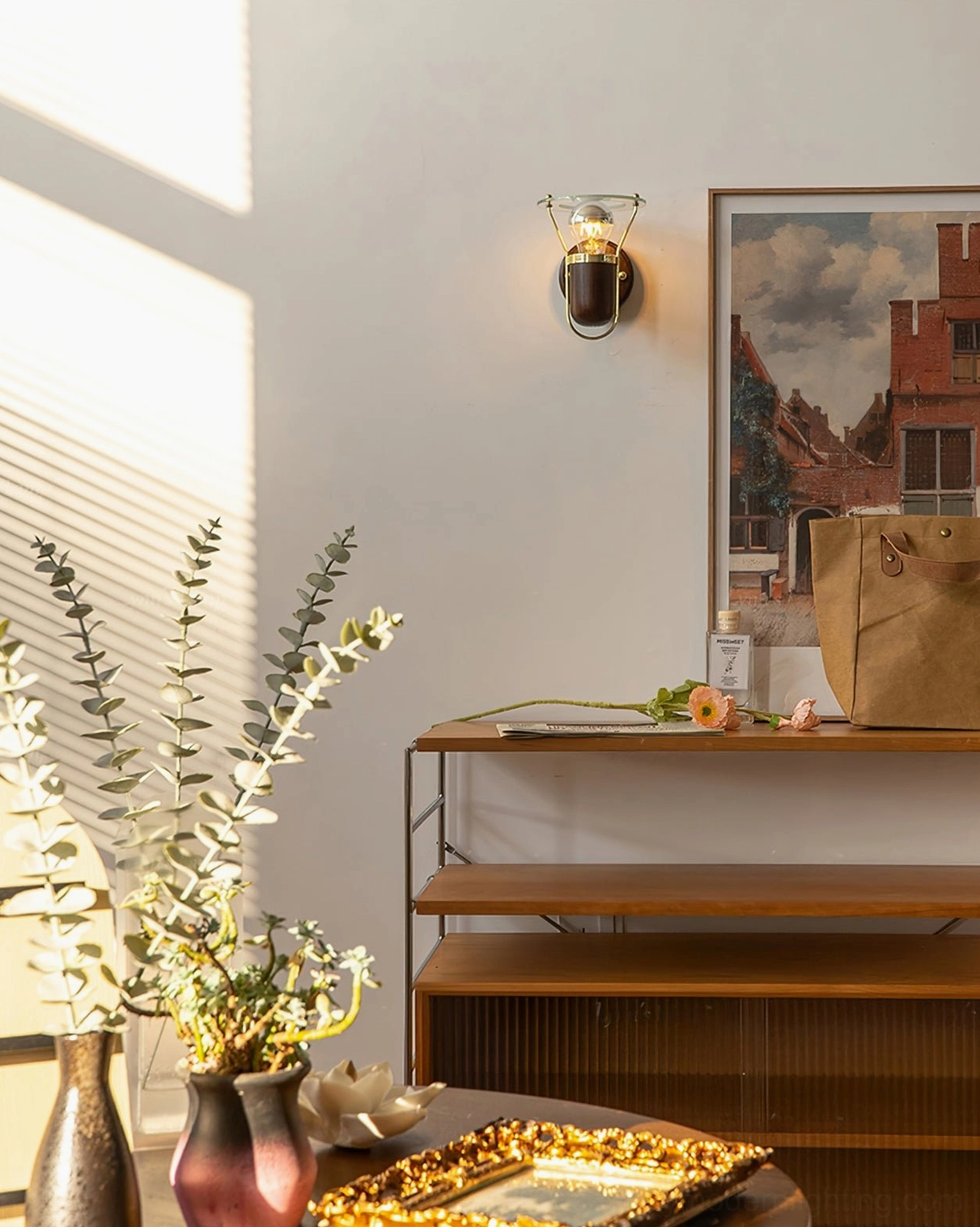 Vaughan wall sconce installed in bedroom creating bedside reading light with mid-century aesthetic