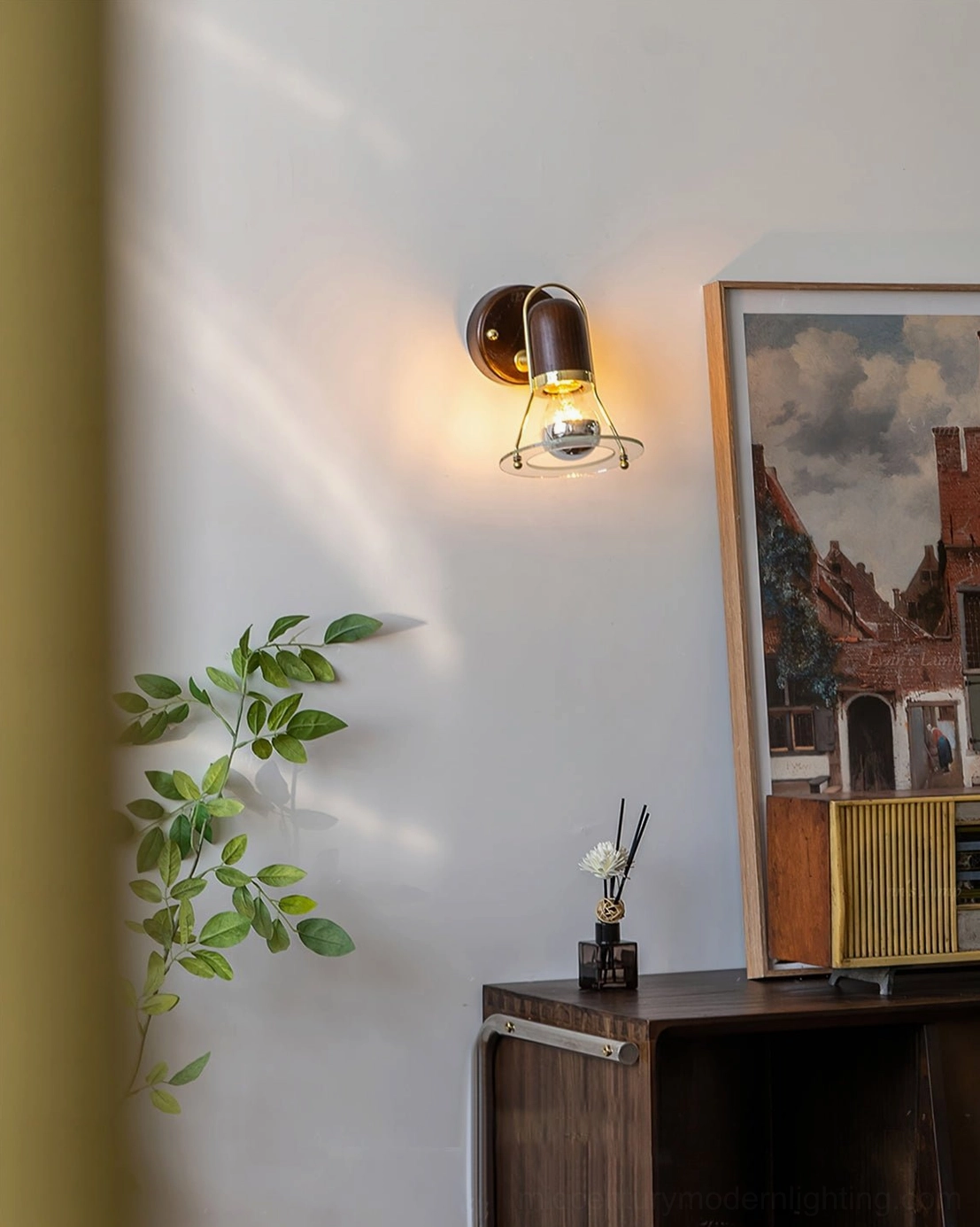 Vaughan wall sconce creating cozy warm ambient lighting in modern living room corner