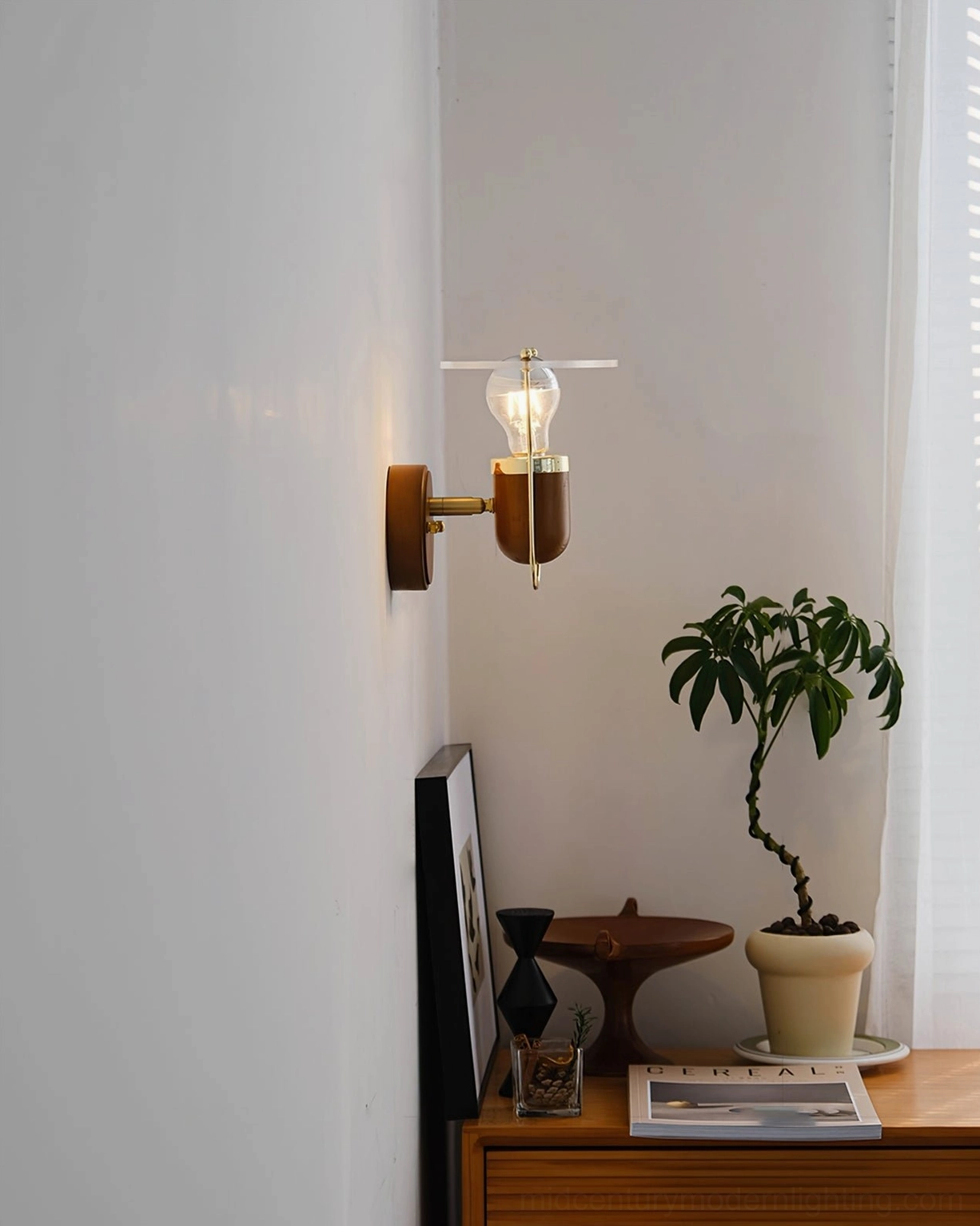 Vaughan mid-century modern wall sconce detail shot of walnut wood texture and brass trim accents