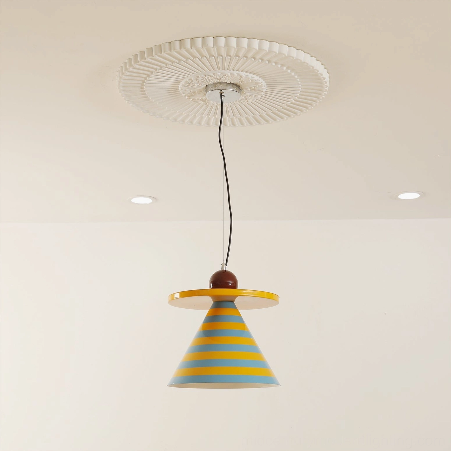 Side angle view of Veepee striped cone pendant lamp showing geometric silhouette and color-blocking detail