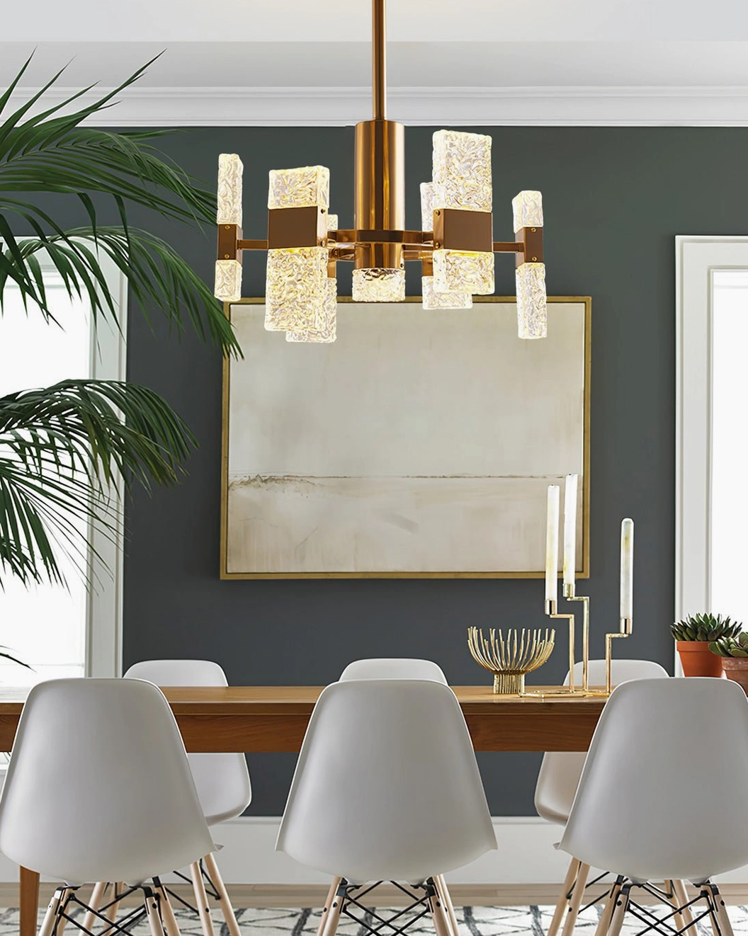 Vega chandelier above dining table in dark green wall modern dining room