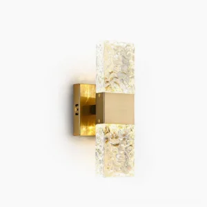 Vega gold wall sconce with textured clear glass diffuser, frontal studio view showcasing mid-century modern design