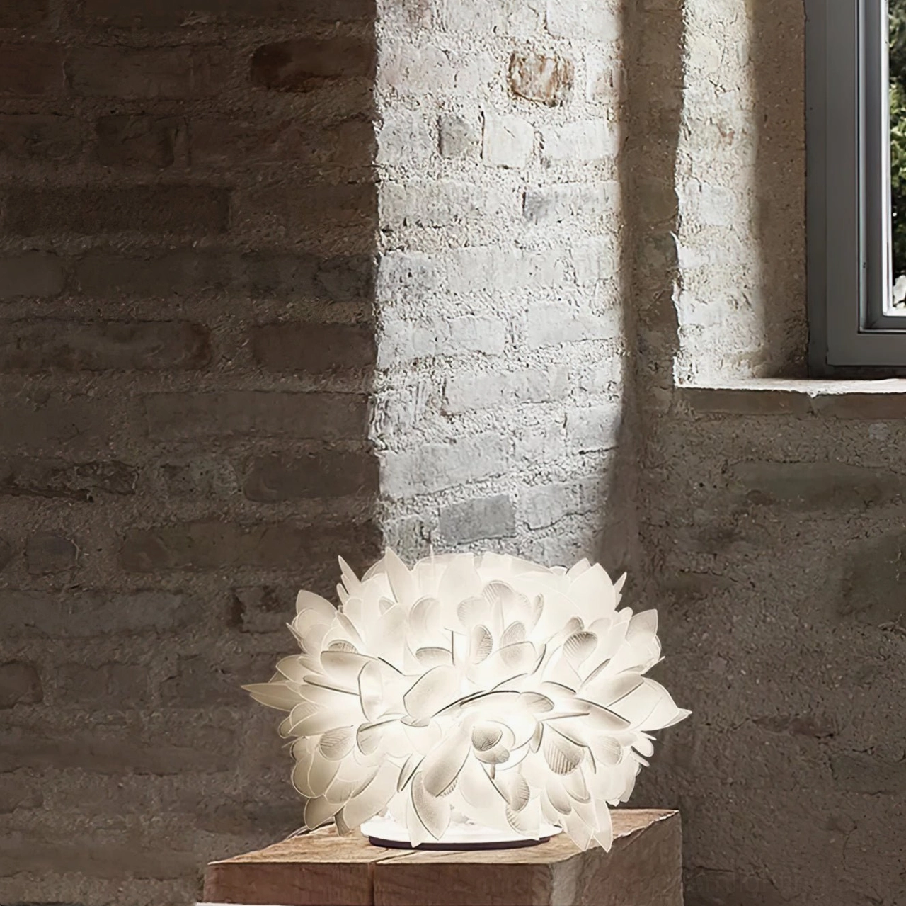 Veli Foliage white petal shade lamp in industrial brick loft with rustic home decor
