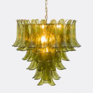 Verdant Petalo chandelier illuminated with warm glowing bulbs, showcasing amber-green light diffusion through translucent glass petals