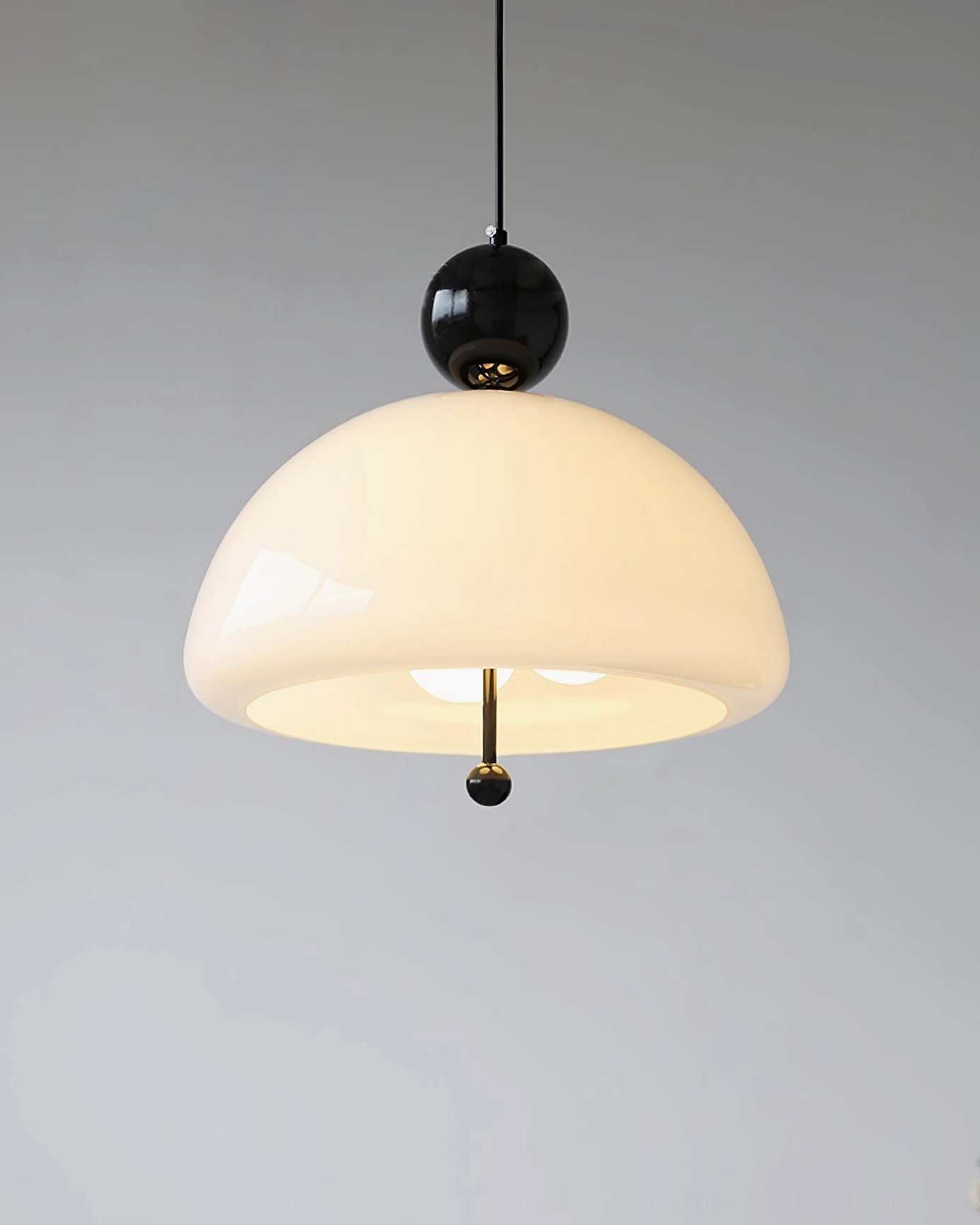 Verona glass pendant lamp positioned in contemporary minimalist interior design setting