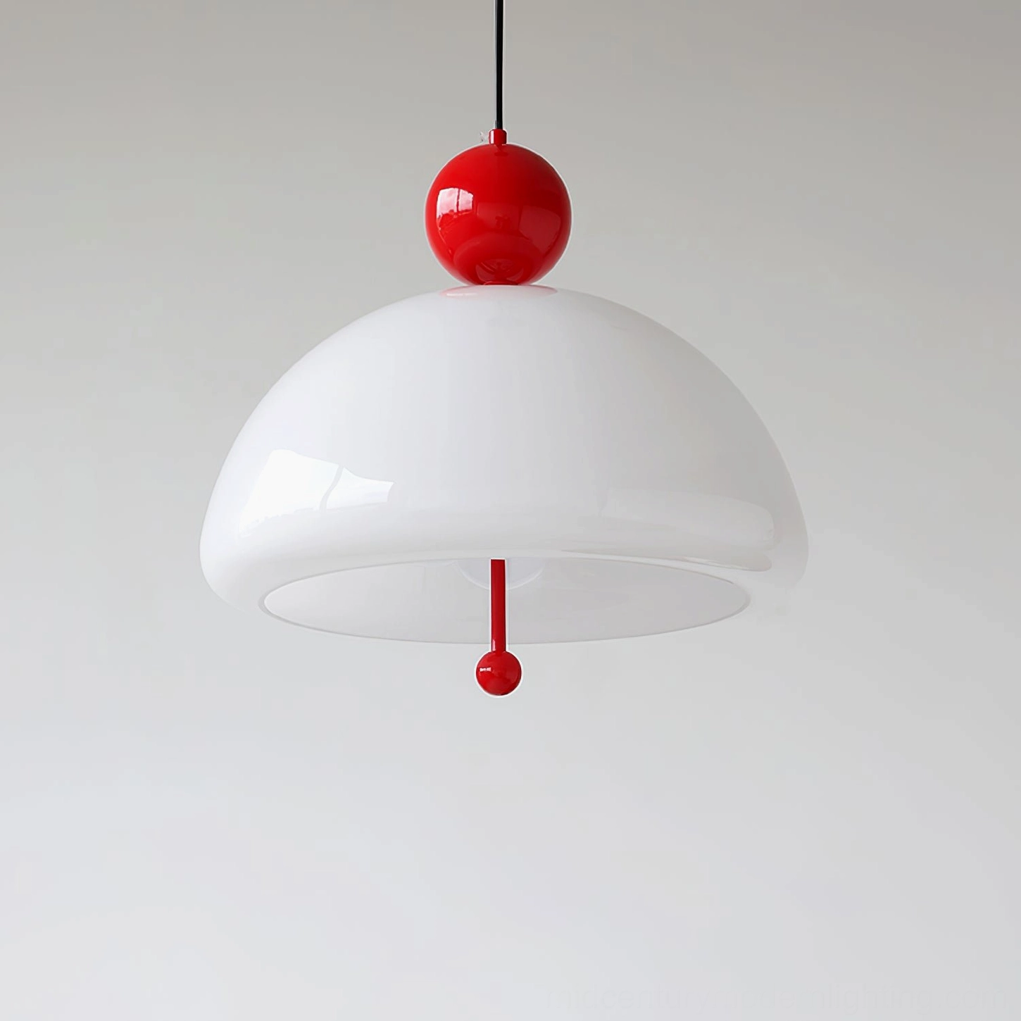 Verona hand-blown glass pendant with pure white dome and red decorative orbs studio photography