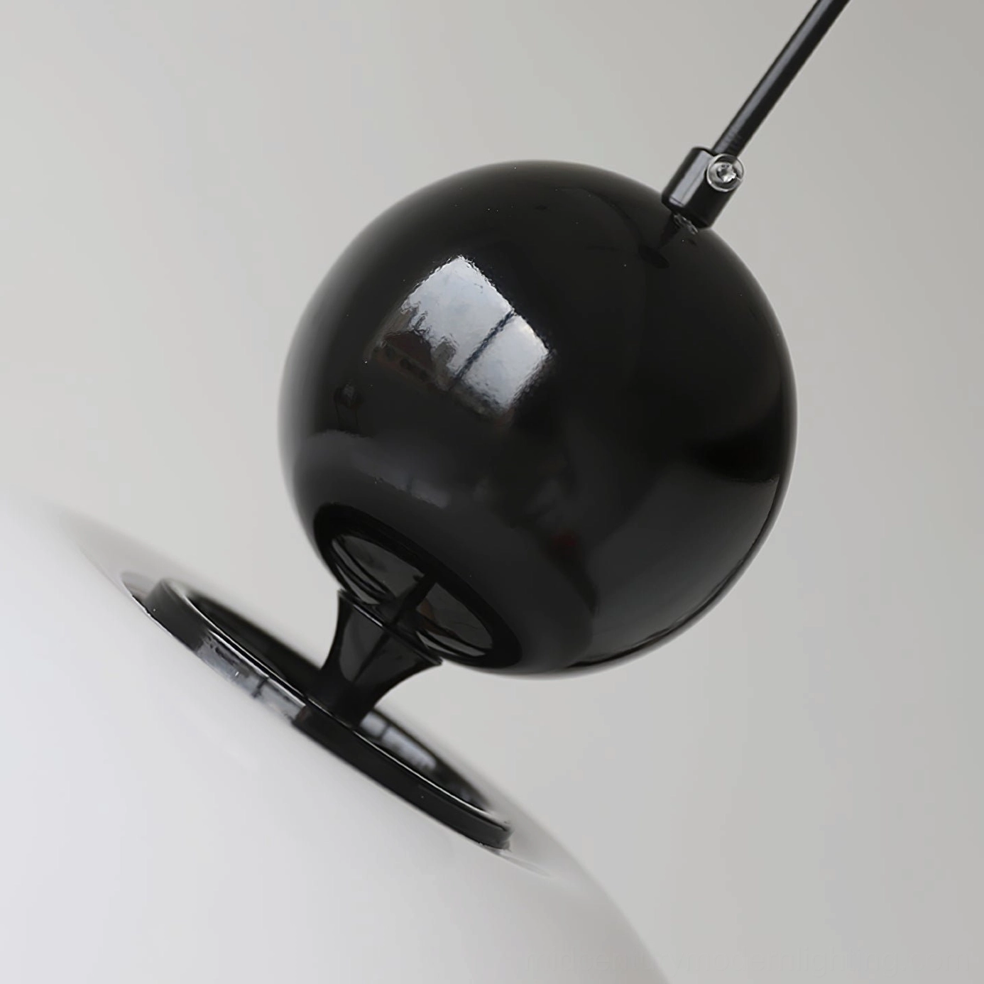 Verona pendant lamp close-up detail showing black metal mounting hardware and structural components