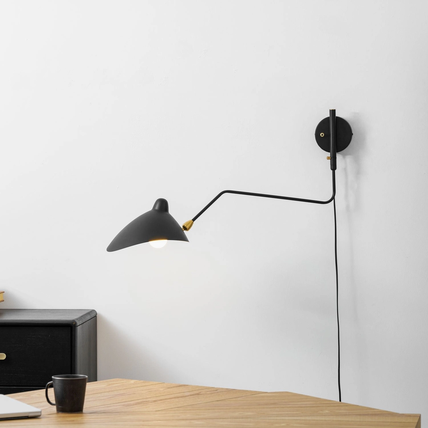 Versatile articulating spider wall sconce adaptable to multiple room design styles