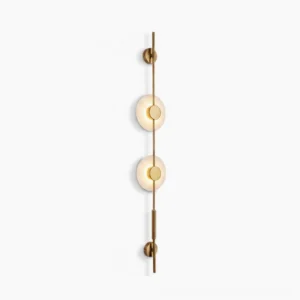 Vertical alabaster wall lamp with two frosted glass discs and brass gold metallic frame on studio white background, front view