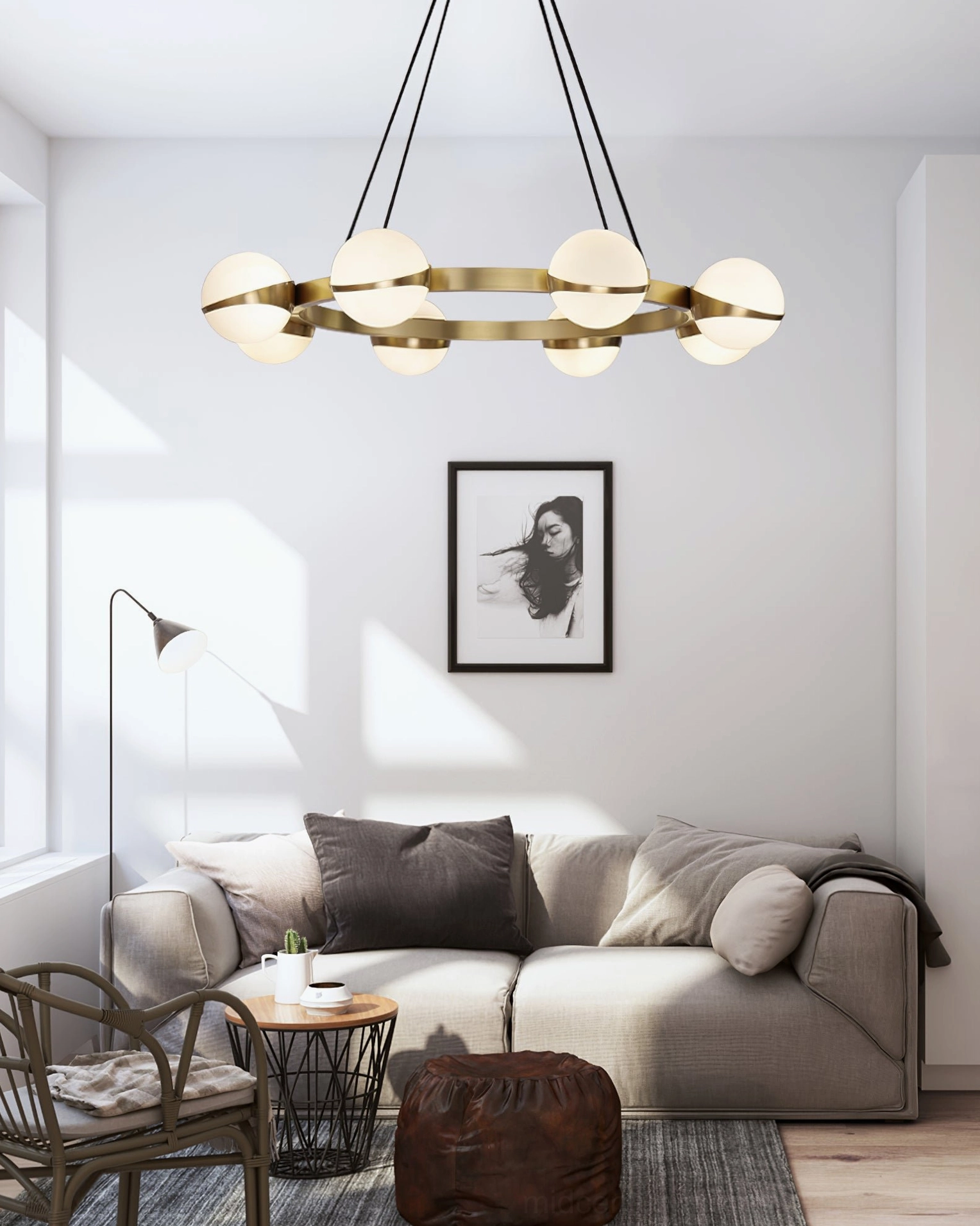 Vertical cluster pendant light with stacked glass globes on brass rod, modern living room with blue accent wall
