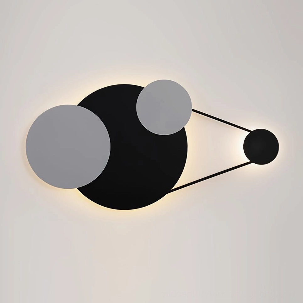 Modern Vertical Trio wall lamp with warm LED backlighting, showing circular disc panels against neutral wall