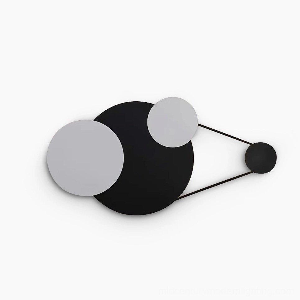 Vertical Trio geometric wall lamp with black metal frame and sand white circular panels, direct front view studio shot