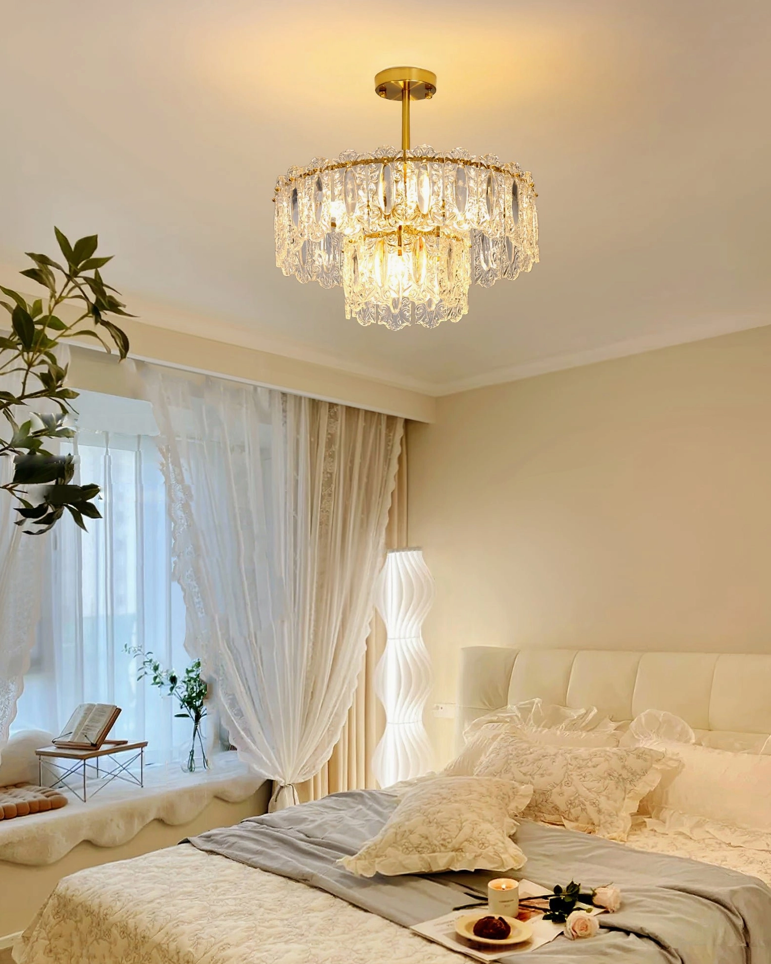 Vienna crystal chandelier featuring hand-formed glass petals with gold metal accents detailed view