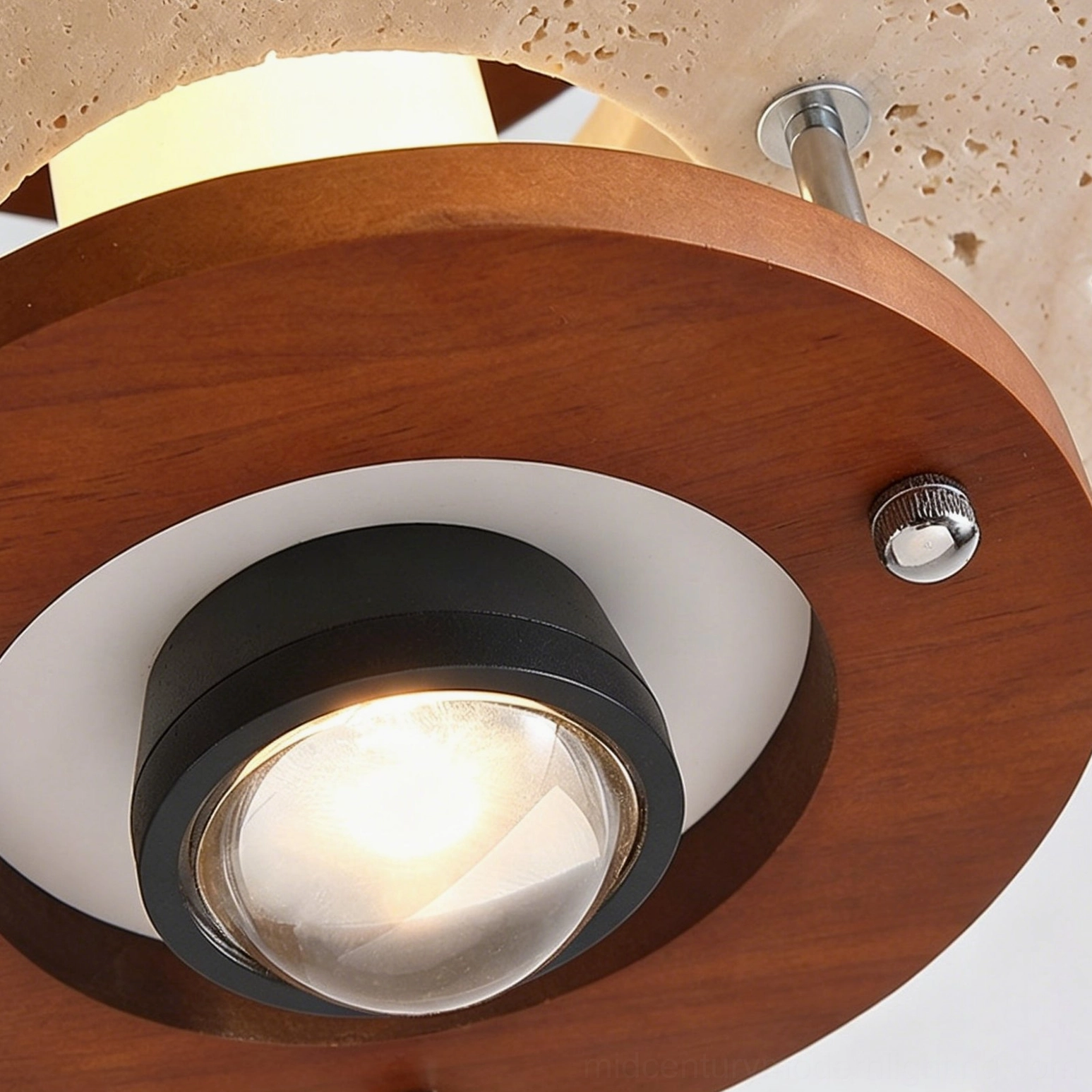Bottom close-up view of travertine pendant lamp fixture showing wooden mounting ring, black metal socket and integrated LED bulb