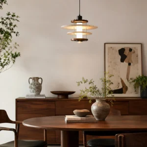 Vigo travertine stone pendant lamp installed in vintage wooden dining room creating warm ambient lighting over table, mid-century modern interior