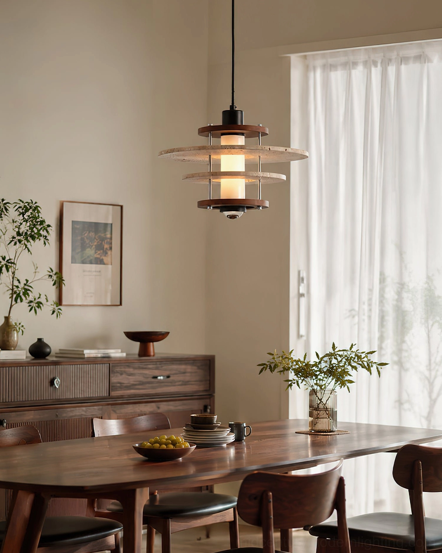 Travertine layered pendant light hanging in farmhouse style dining area with warm natural home decor and wooden furniture, wide view