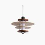 Vigo travertine pendant light featuring multi-layered yellow stone rings with walnut wood frame and black metal hardware on white background, front view mid-century modern design