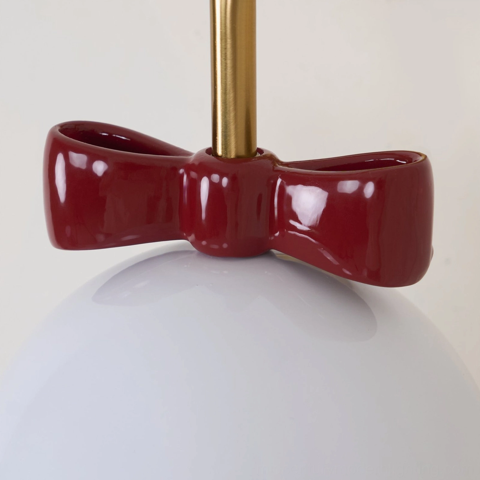Vintage bell wall lamp fixture showing side profile and lighting direction