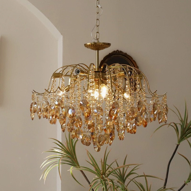 Vintage crystal chandelier full silhouette showing geometric brass framework and balanced crystal pendant arrangement
