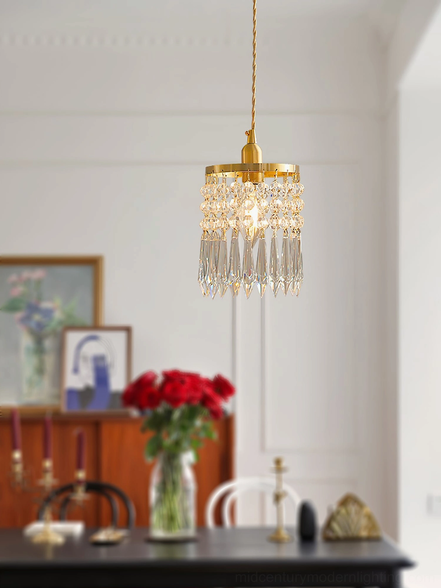Compact crystal pendant lamp illuminating vintage dining room scene
