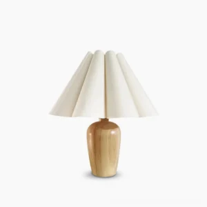 Vintage fluted beige table lamp with wooden base, studio shot on pure white background showcasing pleated linen shade design