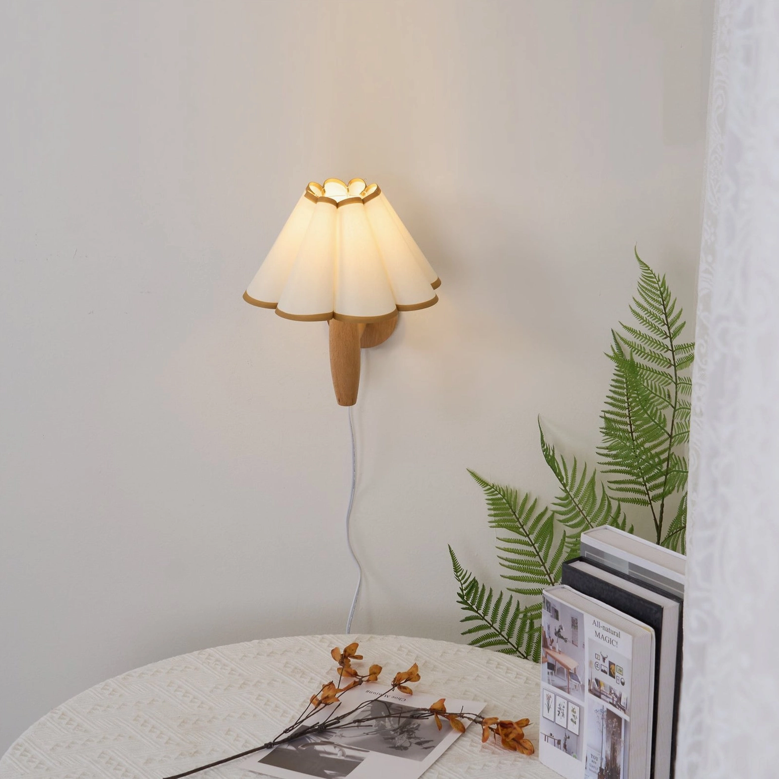 Vintage fluted plug-in wall lamp with beige and black pleated shade pattern detail view