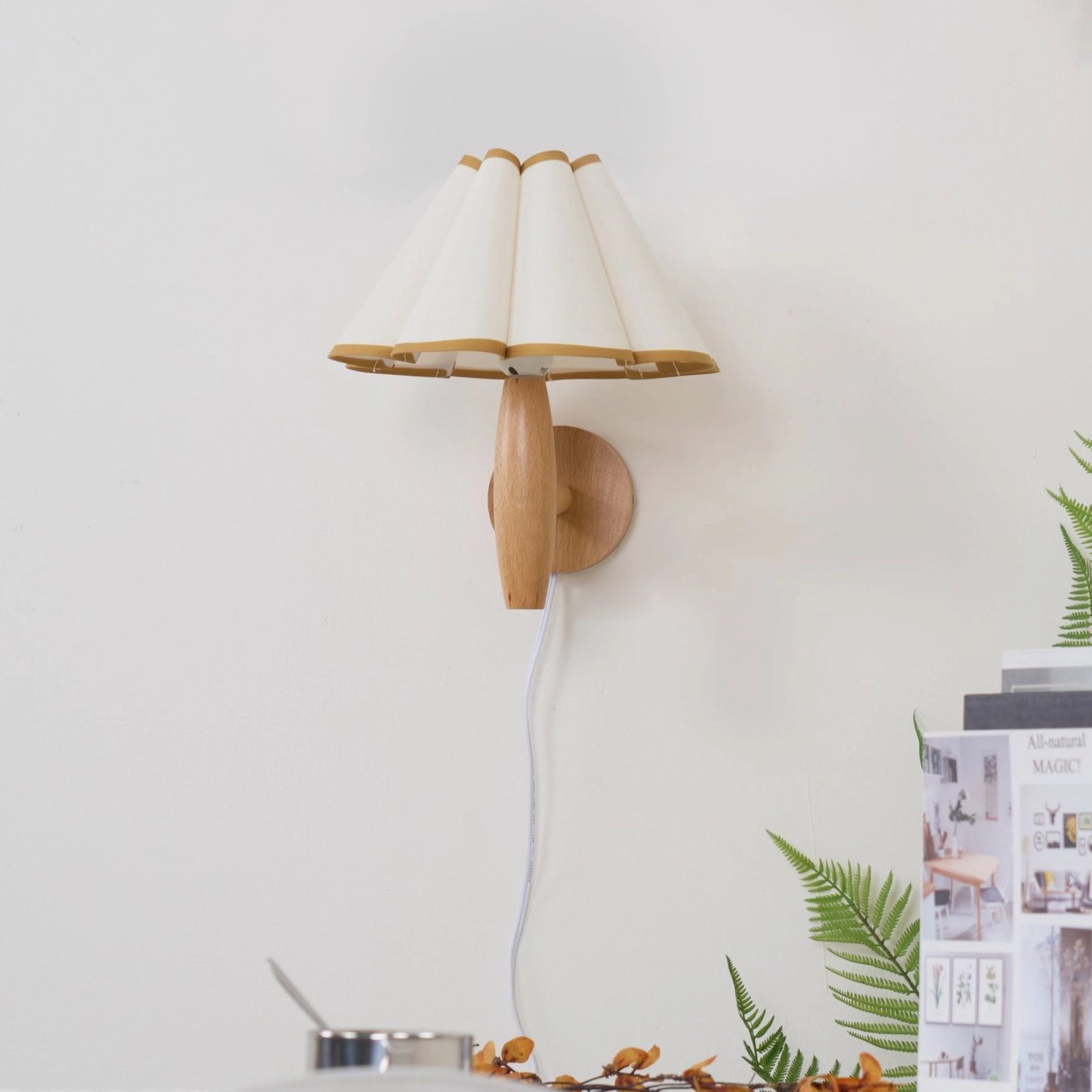 Vintage fluted wall lamp detail showing natural wood backplate mounting and fixture construction