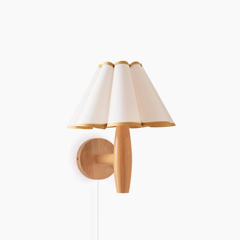 Vintage fluted plug-in wall lamp with white pleated fabric shade and natural wood base, front studio view