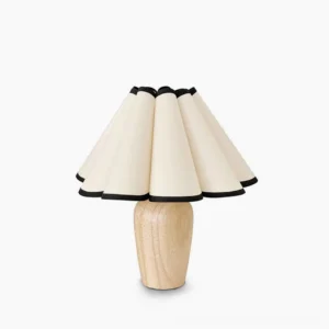 Vintage Fluted Table Lamp with Beige and Black fabric shade on turned wood base, front view on white background