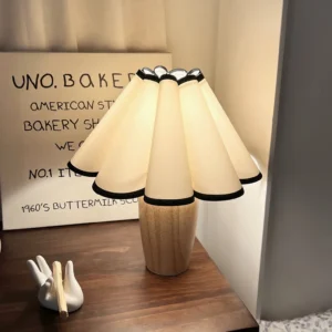 Vintage Fluted Table Lamp with warm light illuminated on wooden table, mid-century modern interior styling