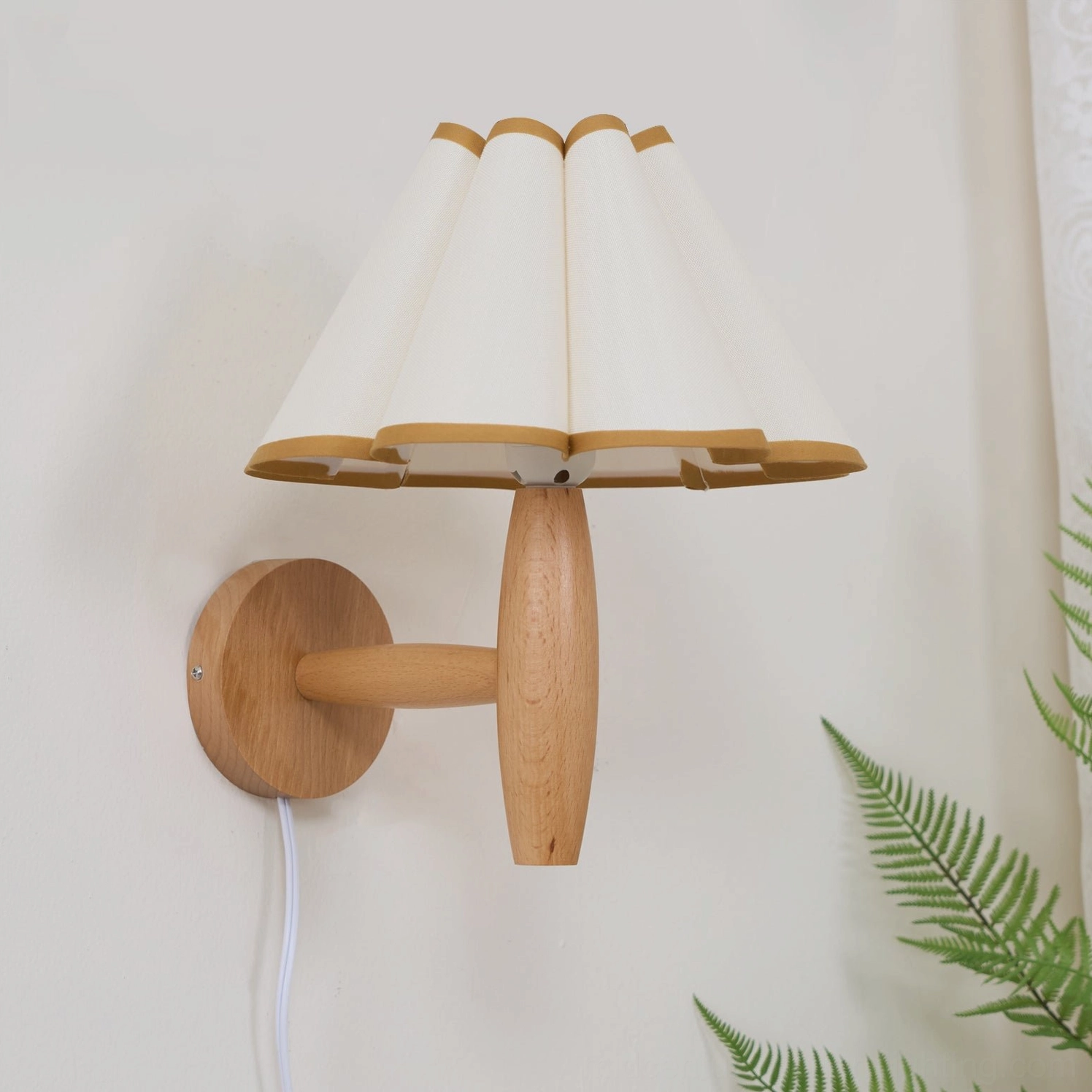 Unlit vintage fluted wall lamp with white pleated shade and gold trim, natural wood mounting