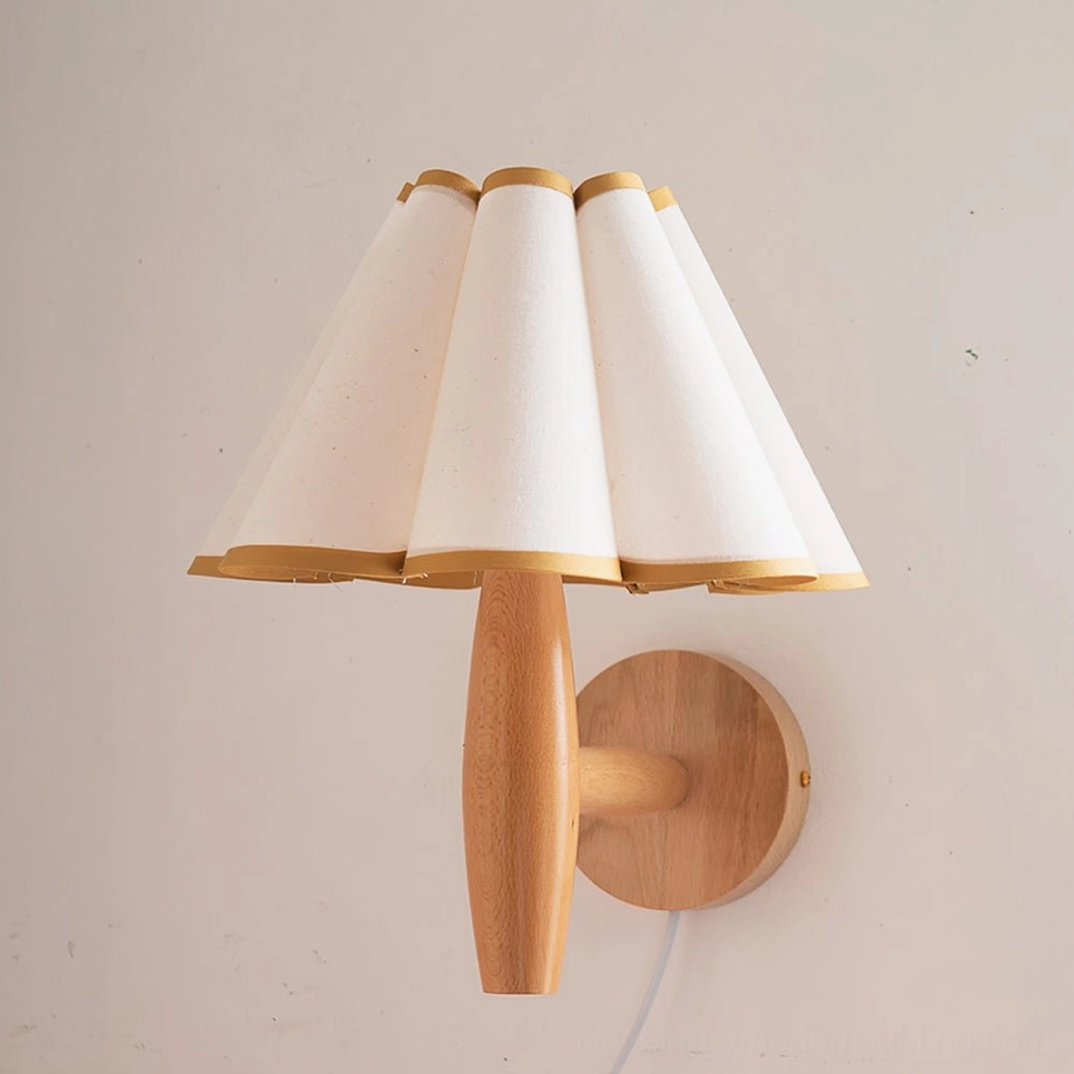 Mid-century modern plug-in wall lamp with white and yellow pleated fabric shade, close-up detail