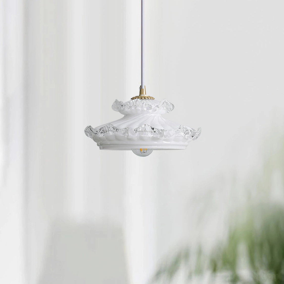Vintage frosted milk glass pendant with ruffled glass detailing and warm light diffusion