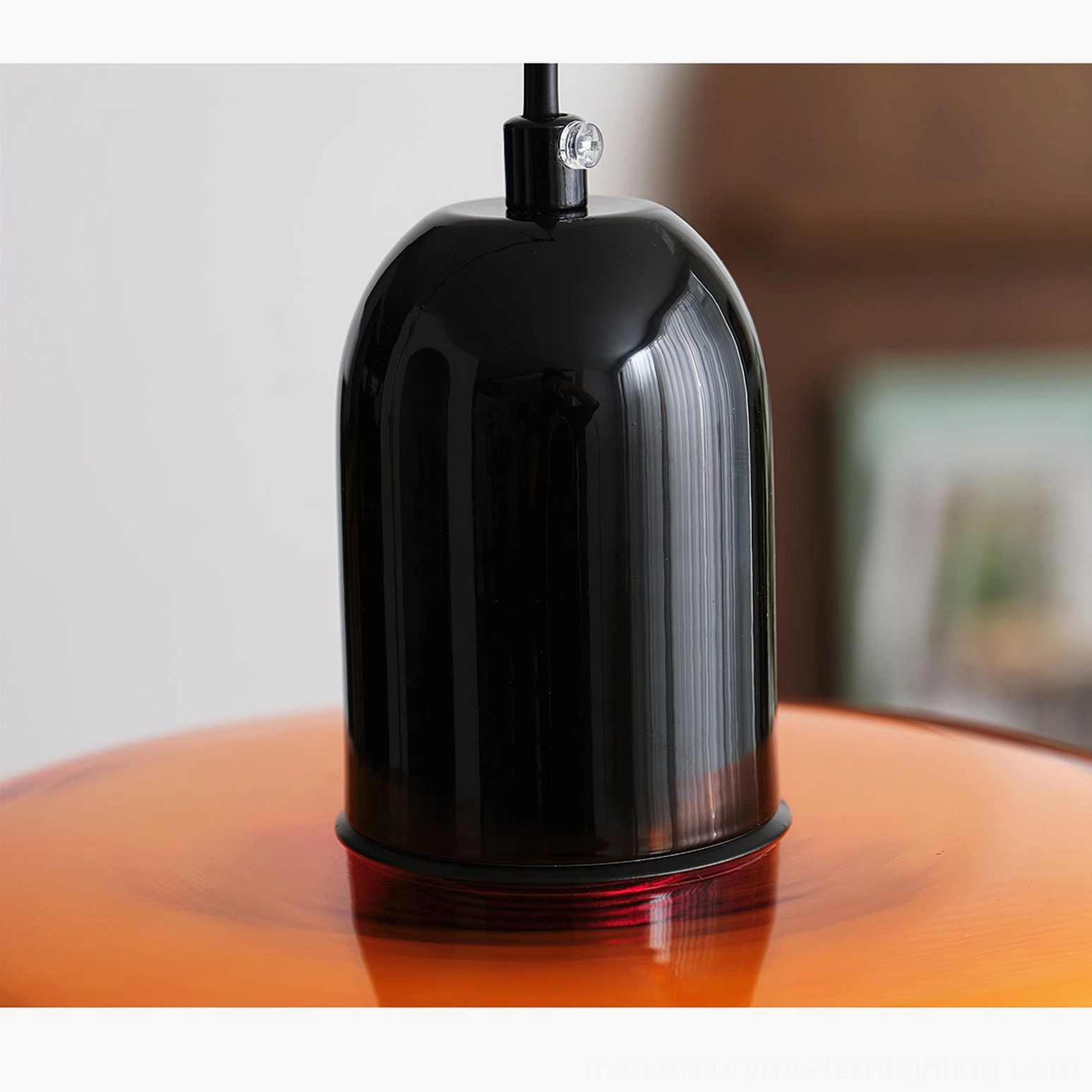 Vintage-inspired pendant lamp with bold geometric color blocking in mid-century modern interior