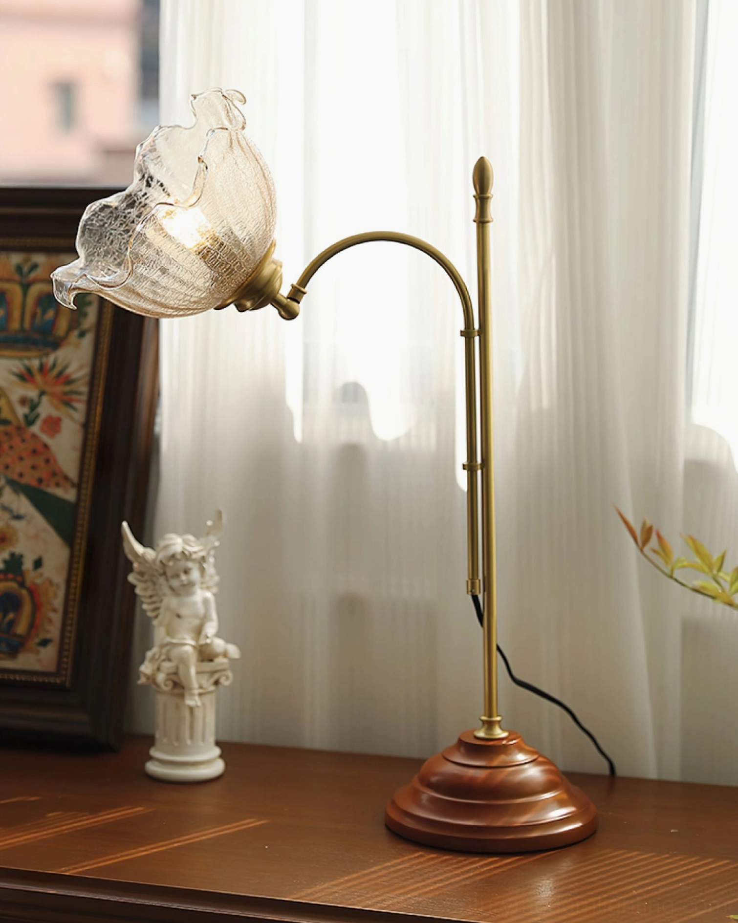 Vintage unlit lamp displayed on wooden table near window with sheer curtains, side angle view