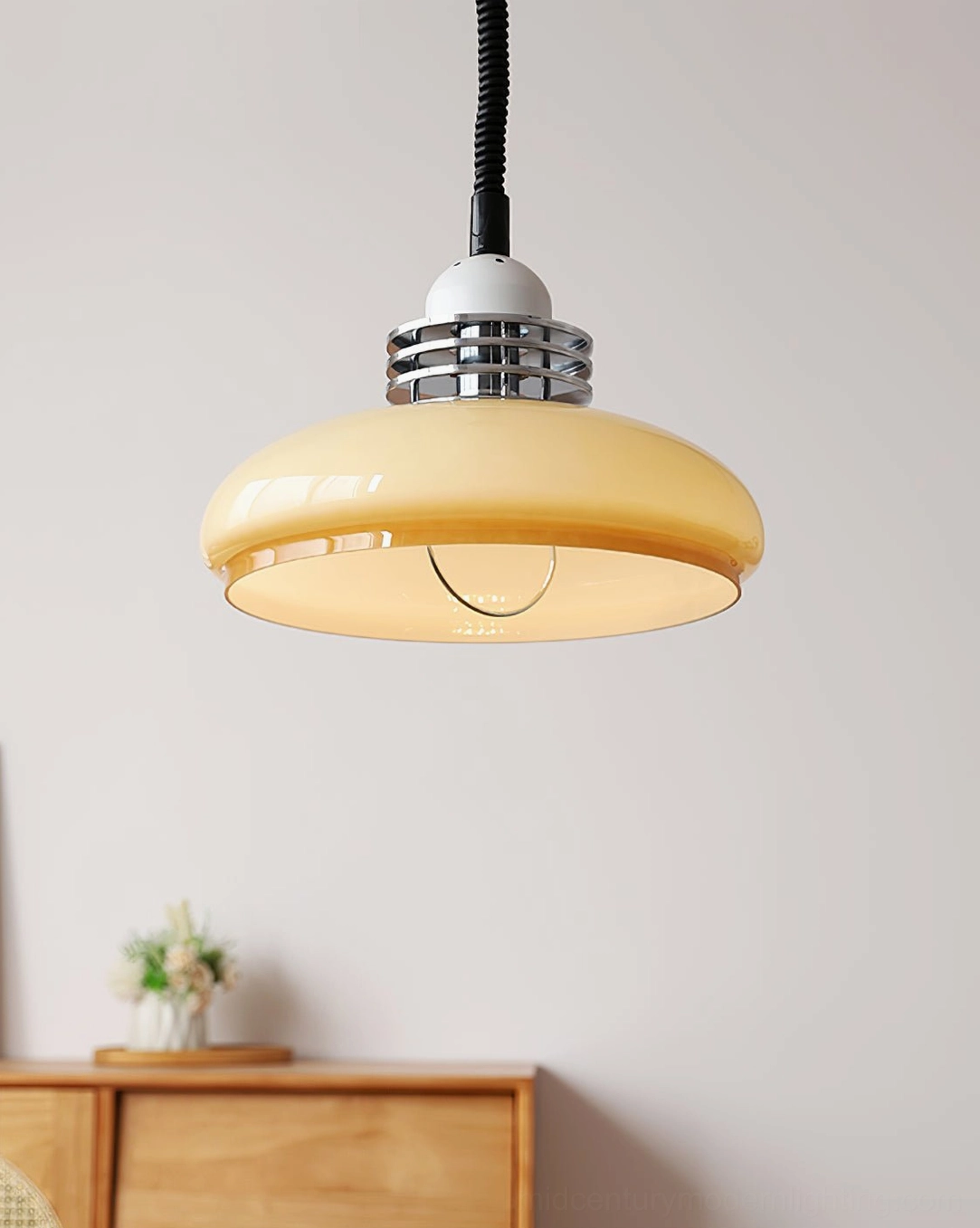 Chrome and gradient glass vintage pendant lamp suspended in gallery-style arrangement showing versatile styling options