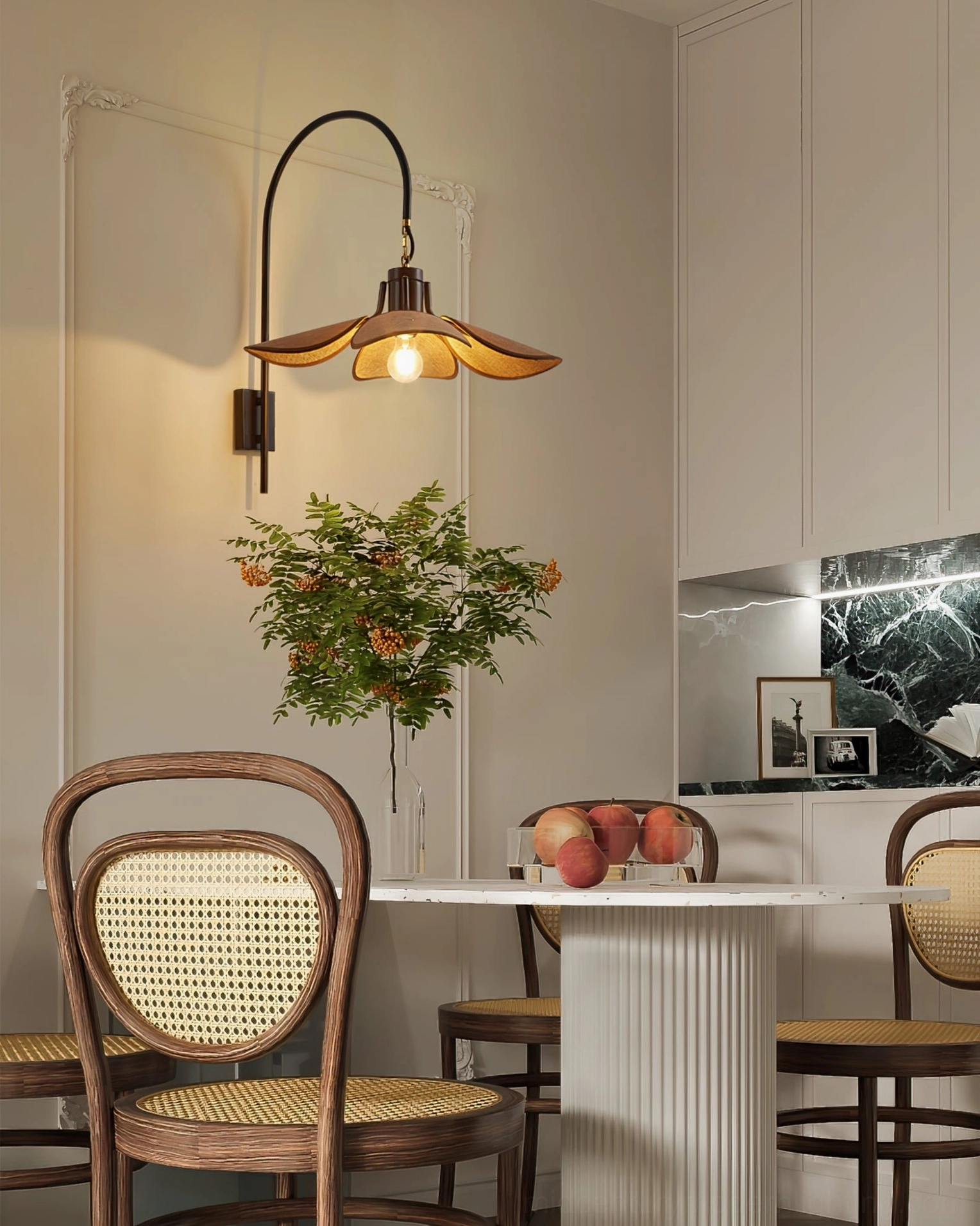 Riankh wall lamp creating cozy warm lighting in dining room with neutral interior design