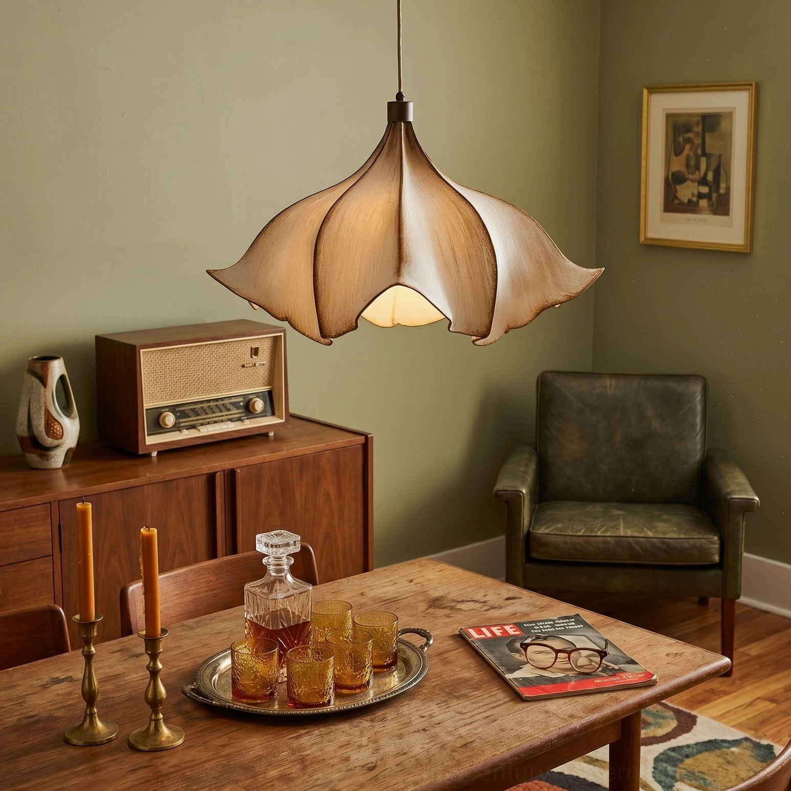 Viscontea pendant light above wooden side table in cozy vintage living corner with retro radio and leather armchair