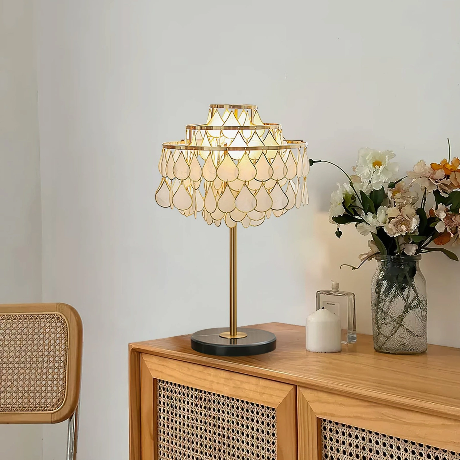 Vivant Shell Table Lamp side view with rattan wooden cabinet and minimalist warm home décor