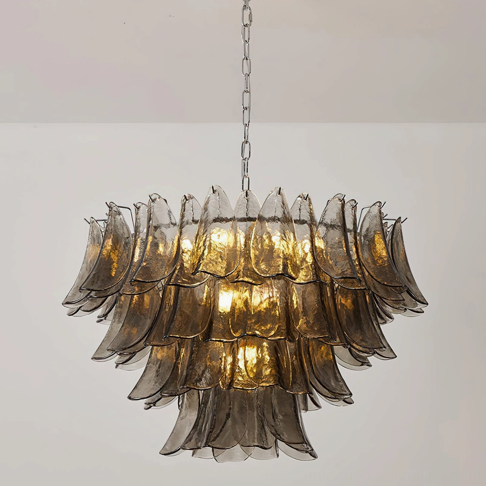 Vivienne glass chandelier front overhead view classic tiered design with warm glowing interior lighting