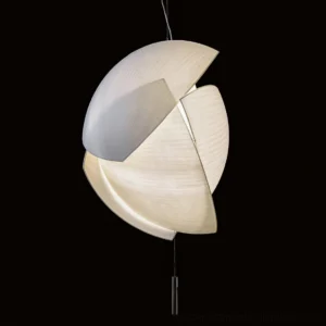 Close-up detail of Voiles pendant lamp with warm glowing light illuminating layered matte textile shade