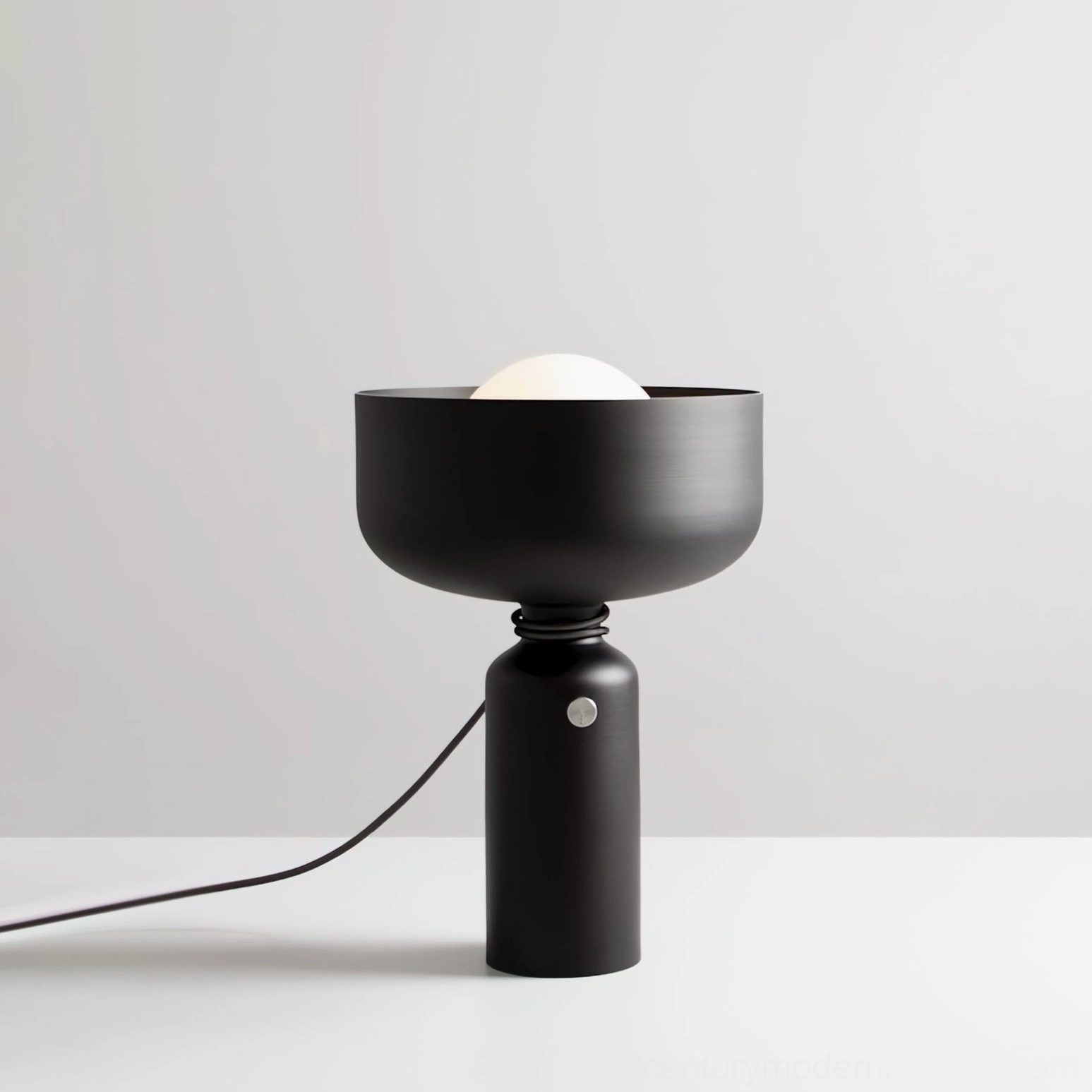 Vol black table lamp three-quarter angle with spherical inner bulb and round base switch