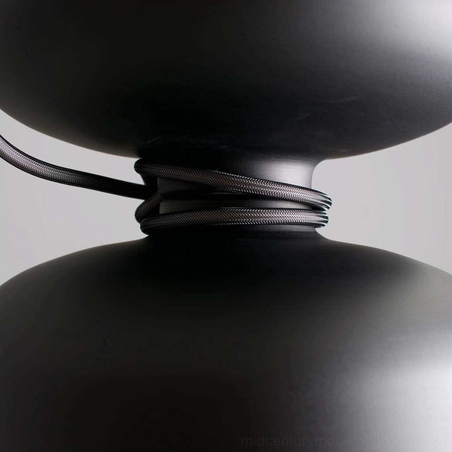 Vol table lamp knotted power cord close-up overhead detail shot