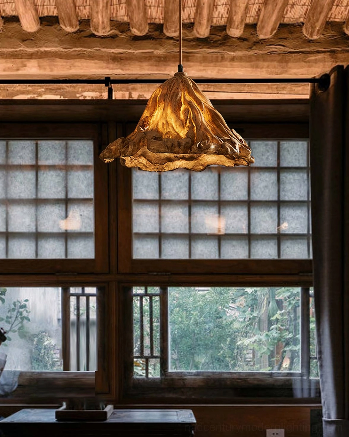 Volcano pendant lamp creating warm ambient lighting in traditional vintage dining room with wooden grid windows