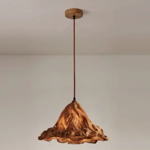 Brown Volcano pendant lamp installed in minimalist interior with wooden ceiling canopy and natural rustic texture