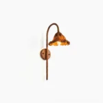 Volcano wall sconce with sculptural molten textured shade, full side view on white background, rustic wood-inspired finish