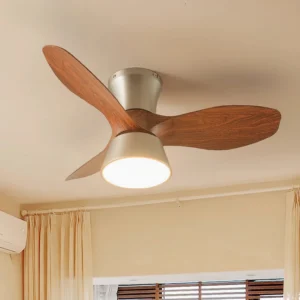 Volos integrated LED ceiling fan light installed in residential bedroom, three curved blade design, warm lighting