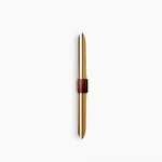 Voya minimalist wall lamp with gold finish and brown leather accent strap, front view on white background