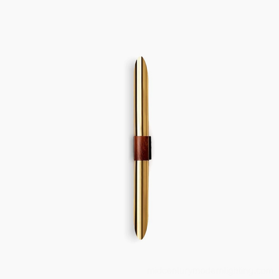 Voya minimalist wall lamp with gold finish and brown leather accent strap, front view on white background