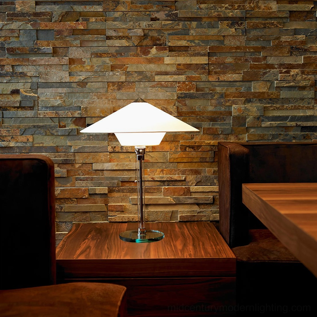 Wagenfeld table lamp stone wall dining lounge wooden side table upholstered seating warm ambient lighting